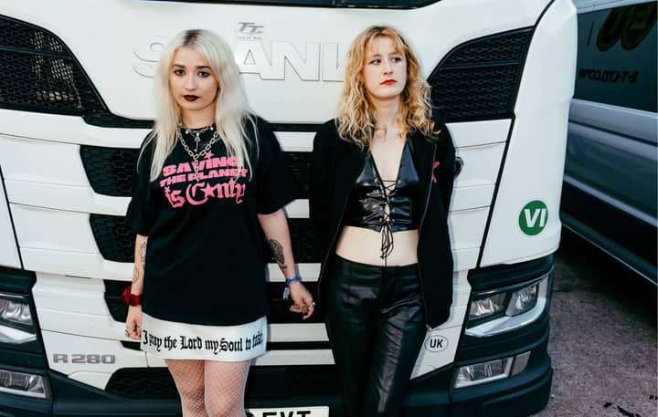 Lambrini Girls and Music Declares Emergency team up for ‘Hot Girls F*ck The System’ merch collection