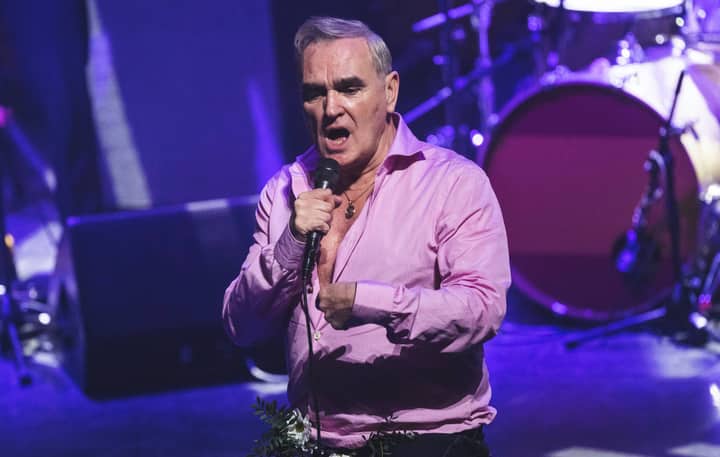 Morrissey’s team reportedly get parody post of ‘The Malefactors’ enemy list taken down, R.E.M.’s Mike Mills responds to being listed